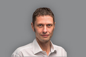 Headshot of Andy Barton, Director