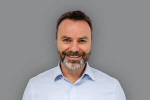 Headshot of Tim Howell, Managing Director