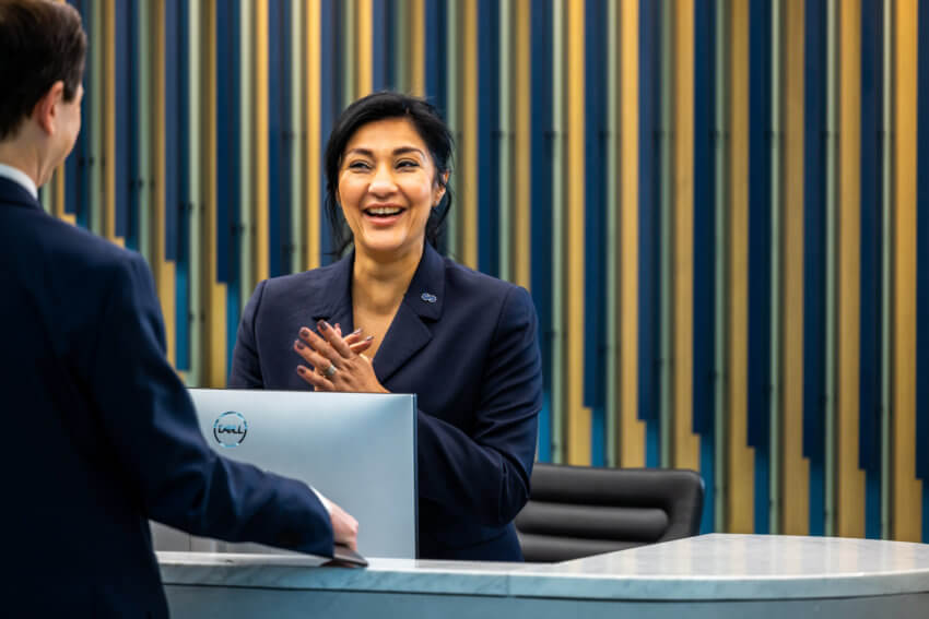 Image of a receptionist smiling