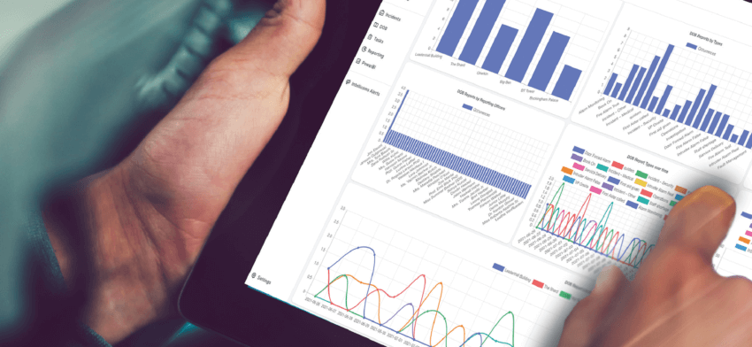 Close up of a man analysing data on an iPad